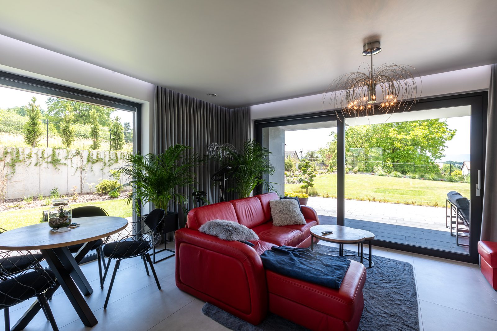 Dark-framed lift-slide patio door in a living room